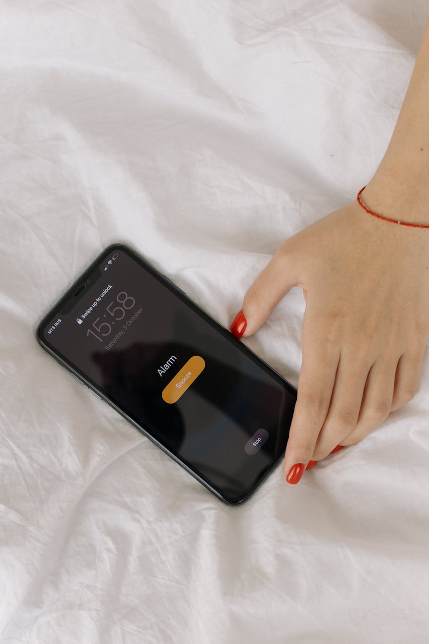 person holding a black smartphone